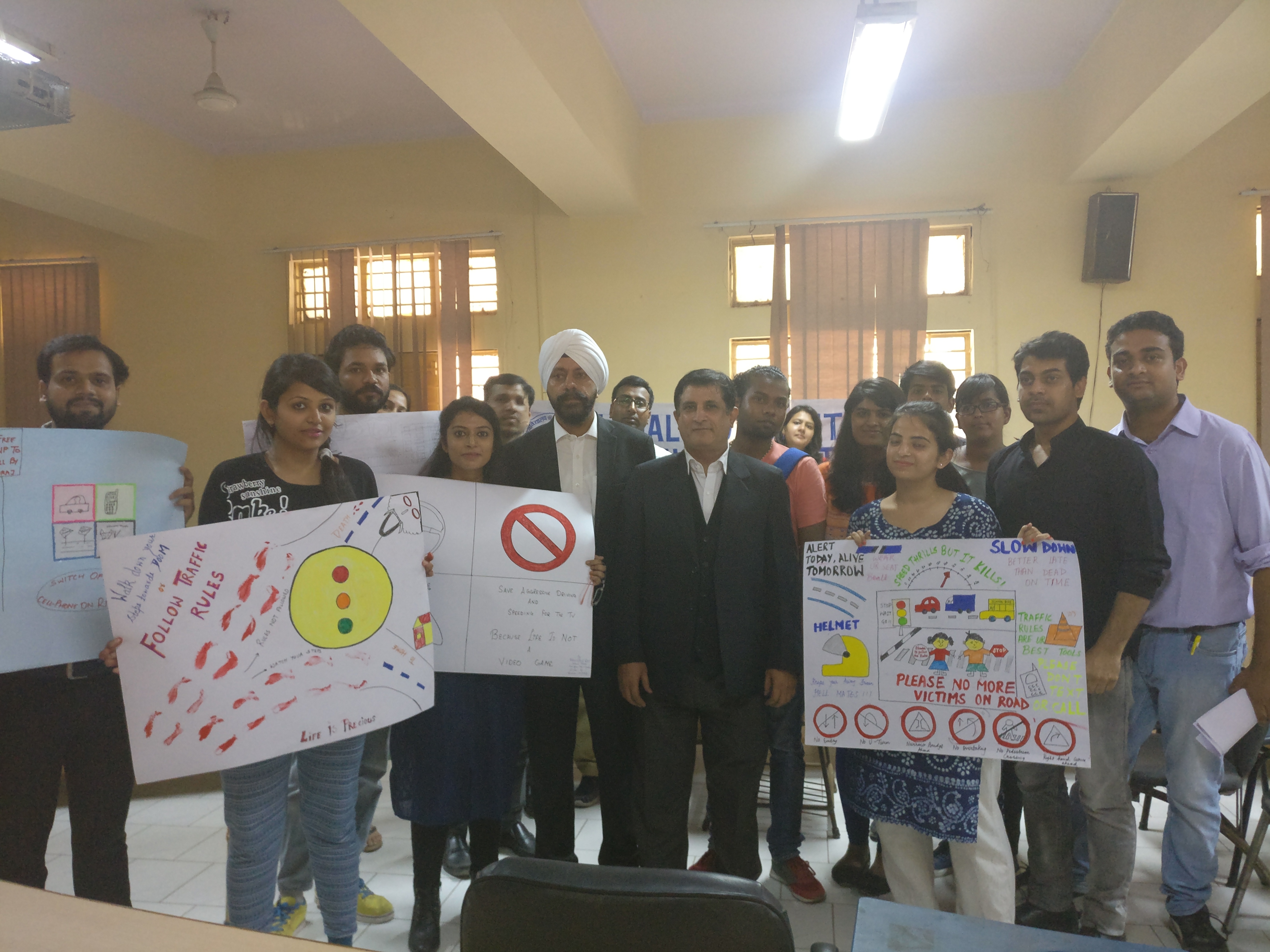 Awareness Programme on “Painting  Competition” on  “Traffic Laws &  Services being provided  by DLSAs”  conducted on 30.09.16 at “Law Centre”, Faculty of Law, University  of Delhi. Sh.  Charan Jeet, LAC  as resource Person.